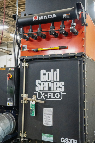 Laser machine at Niagara Specialty Metals used to process blade components supporting the benefits of MagnaCut knives