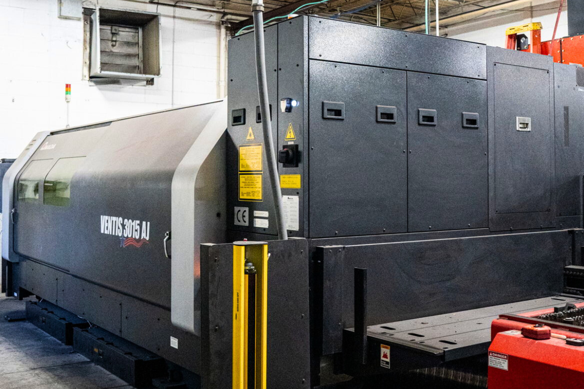 Laser cutting machine processing knife steel at Niagara Specialty Metals supporting the DLT Trading Niagara relationship.
