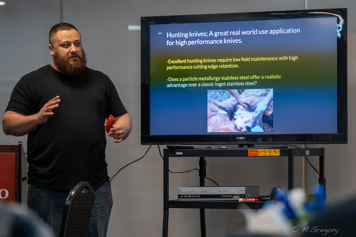 Shawn Houston presenting on knife steel performance and real-world testing at ASM Buffalo technical event