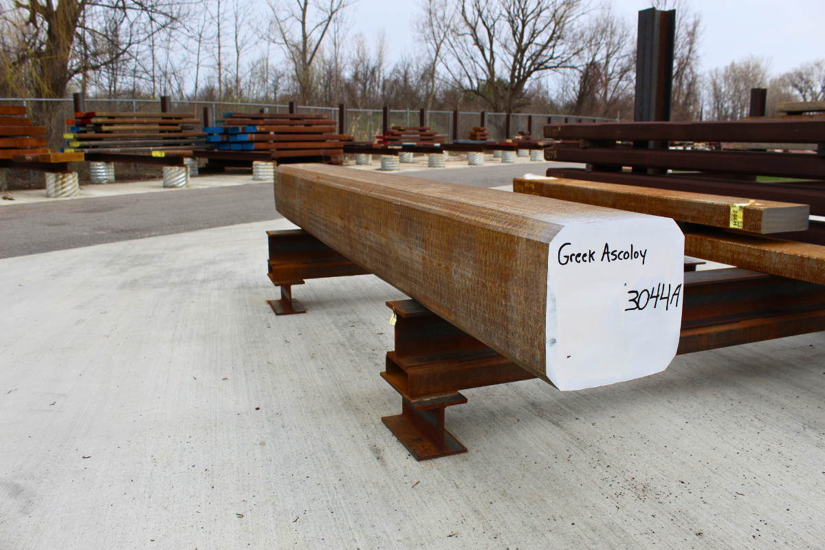 DFARS compliant maraging steel inventory shown with Greek Ascoloy billet in Niagara Specialty Metals billet yard for aerospace and defense applications