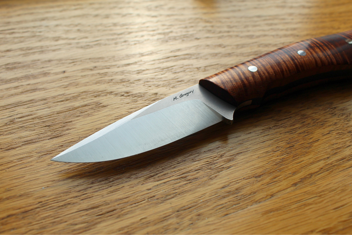 custom knife made from MagnaMax knife steel by Matt Gregory showing finished blade and handle