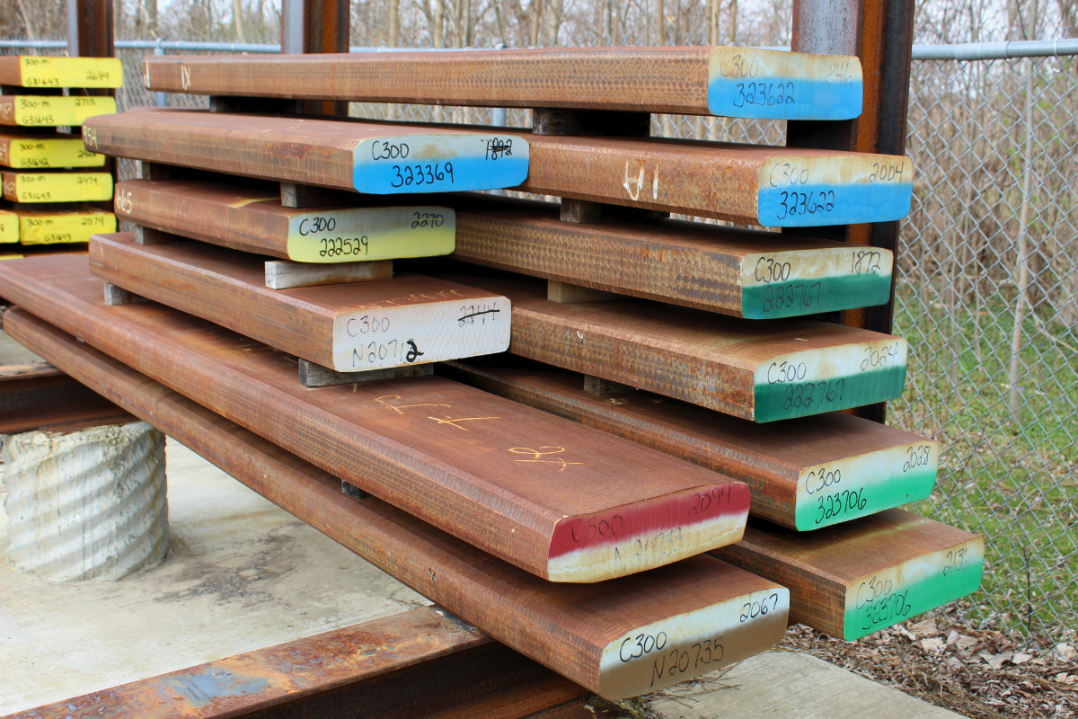 Maraging steel supply chain process showing C300 billets stored in Niagara Specialty Metals billet yard ready for rolling and processing