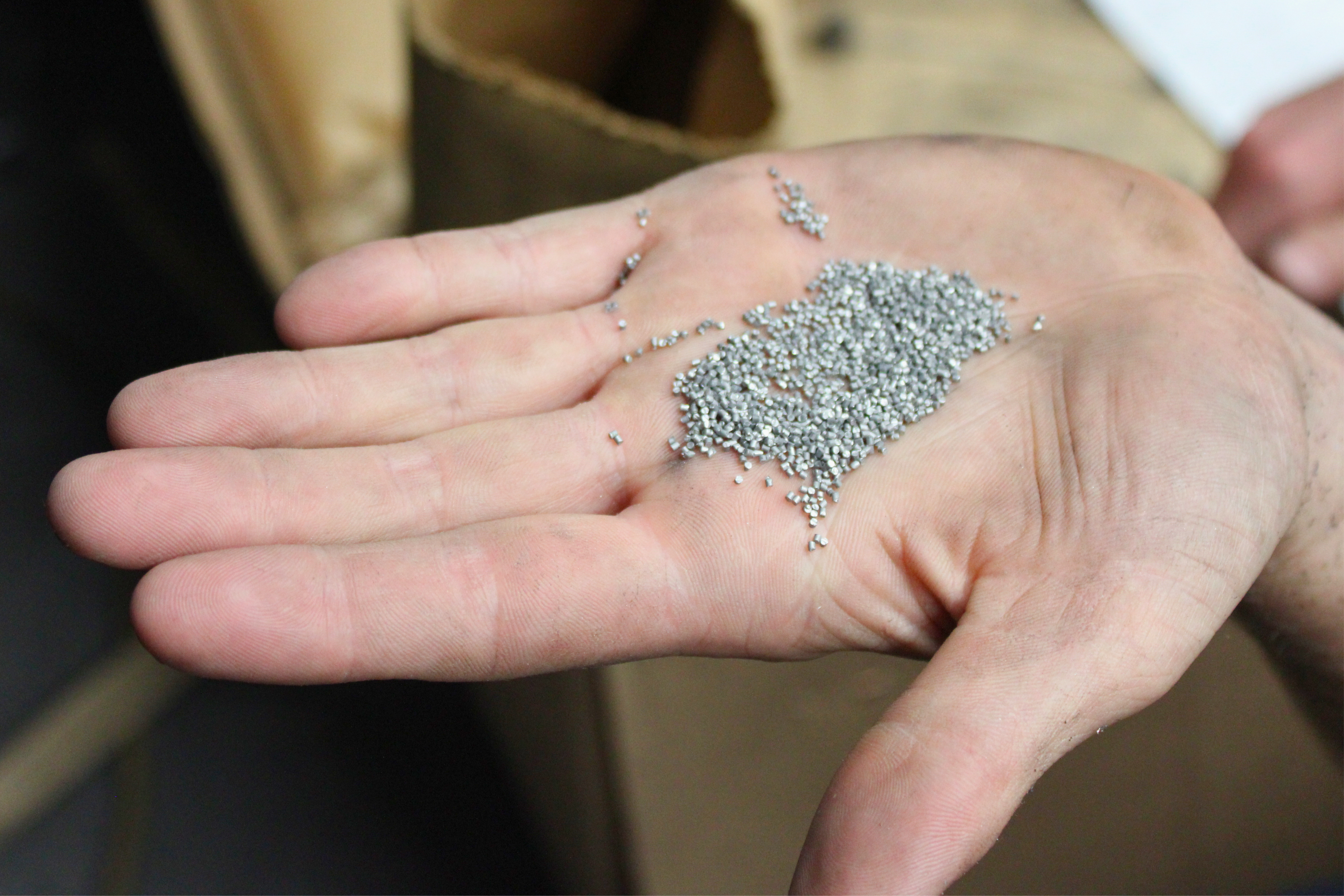 Shot blasting stainless steel abrasive media used to remove oxide scale from specialty metal