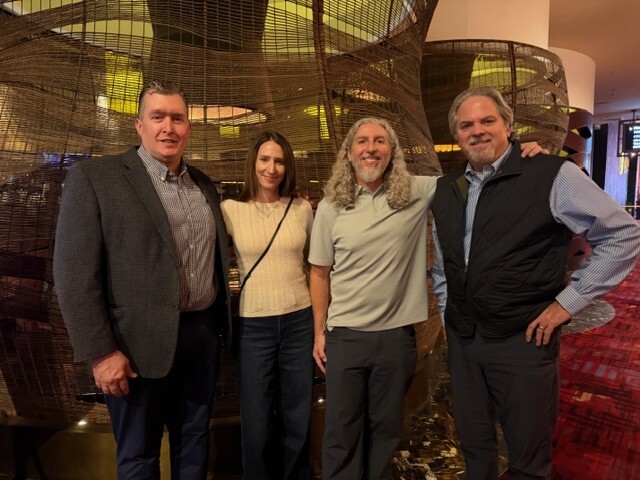SHOT Show 2026 recap image of Tim Gelnett, Carl Stroud, Eric Glesser, and Bethany Glesser