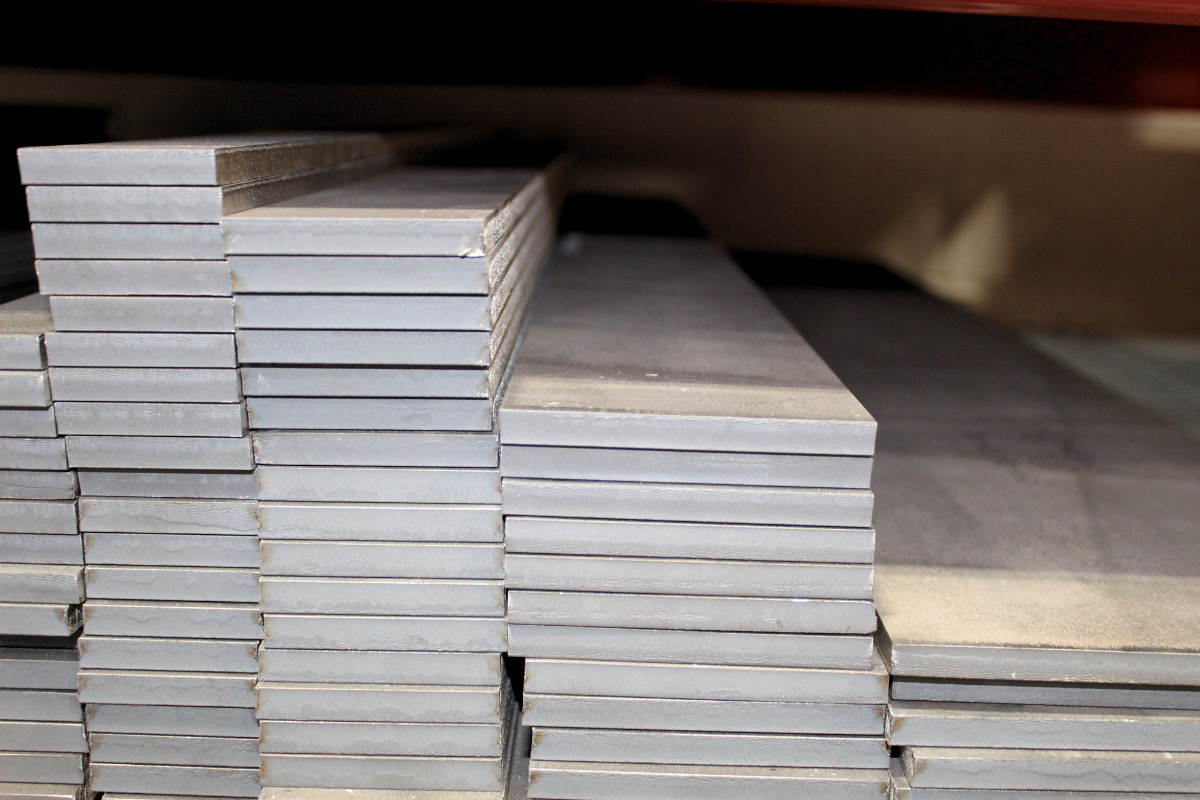 MagnaMax&trade; steel strips in multiple cut sizes stored in the warehouse to support MagnaMax steel performance in custom knife manufacturing. 